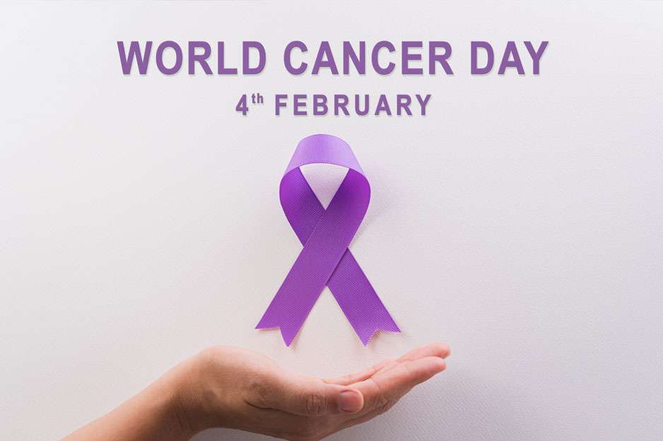 Hand holding a purple ribbon with the words 'World Cancer Day'